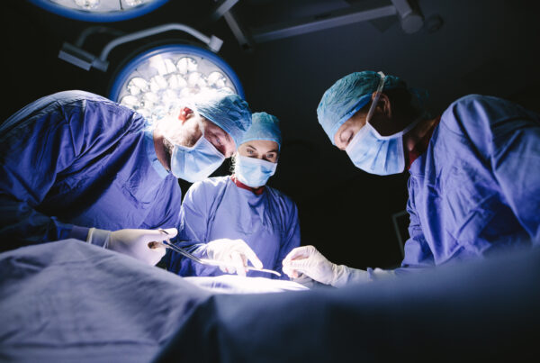 three surgeons in optimize the value of surgical care in OR